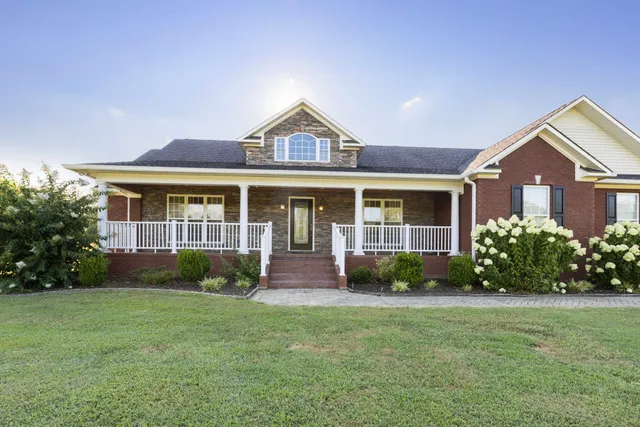 front view of a house with a yard