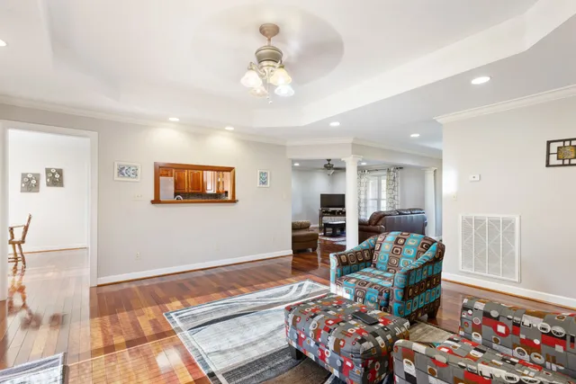 a bedroom with a large bed and a tv