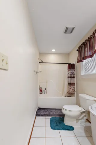 a view of a lake with a yard