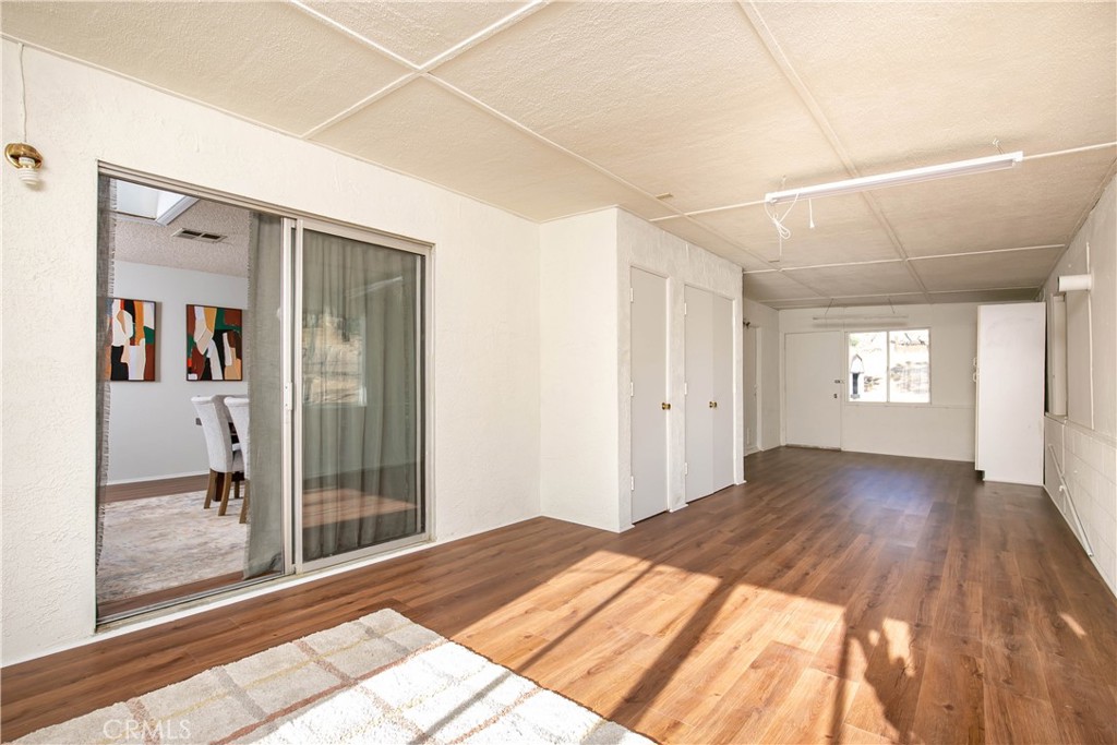 46404 Kings Canyon Road Lancaster, CA 93536 - Photo 22 of 41 a bedroom with a bed and a window