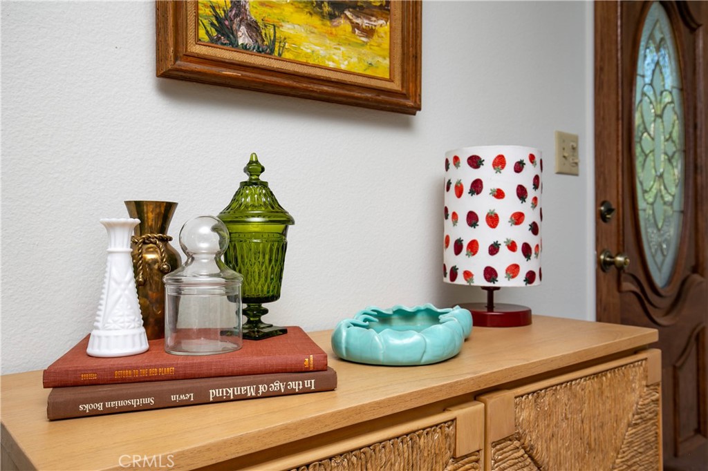 46404 Kings Canyon Road Lancaster, CA 93536 - Photo 4 of 41 a room with lots of potted plants on it and a wooden floor