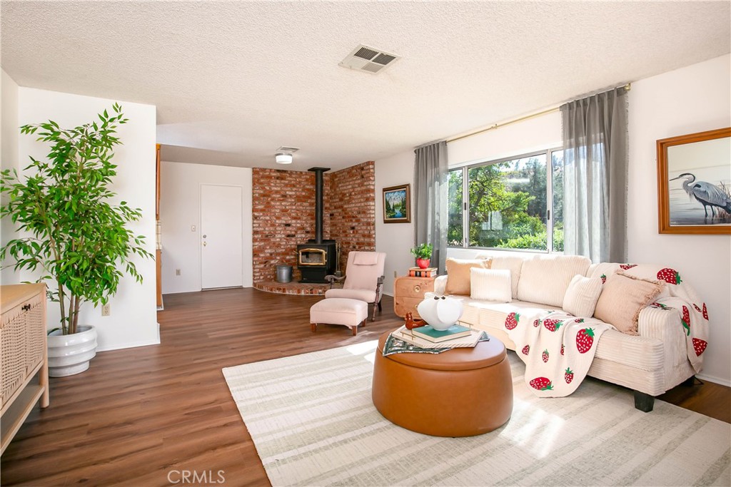 46404 Kings Canyon Road Lancaster, CA 93536 - Photo 5 of 41 a living room with furniture and a large window