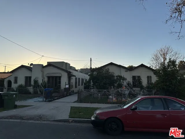 a car parked in front of a house