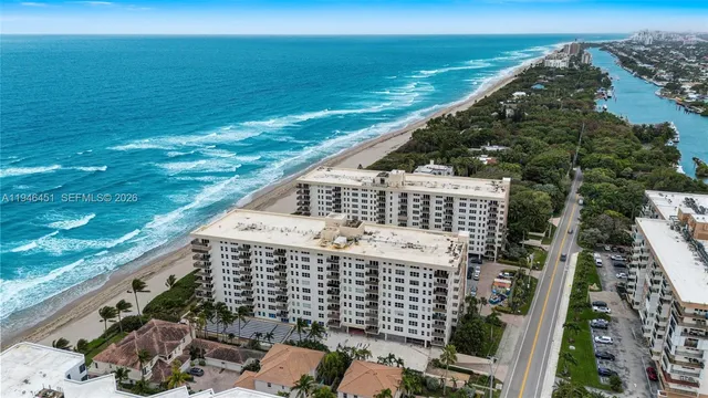 a view of a building with an ocean