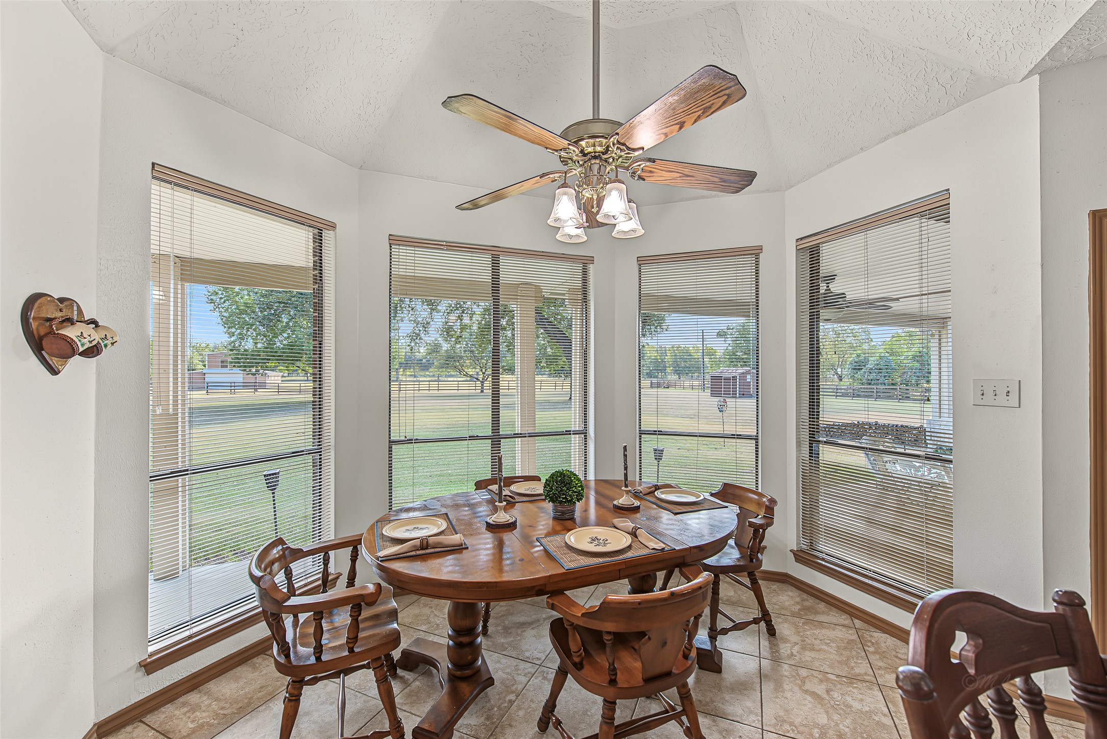 1345 Peach Ridge Road Brookshire, TX 77423 - Photo 21 of 50 You will love how effortlessly this casual dining space flows to the outdoors, offering picturesque views of the grounds and a multi-pane glass door that opens directly onto the covered patio.