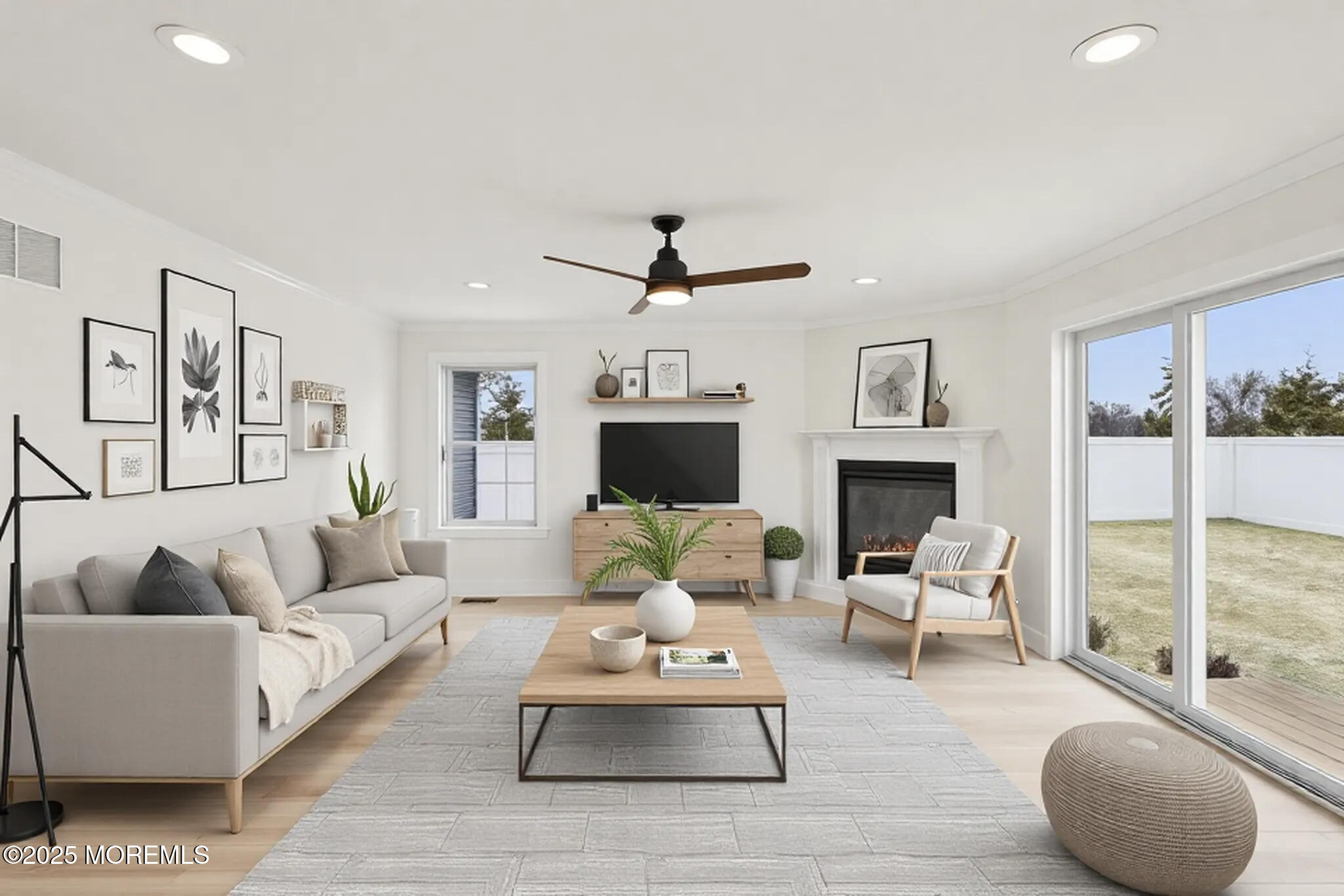 563 Holmdel Road Hazlet, NJ 07730 - Photo 16 of 50 a living room with furniture fireplace and a large window