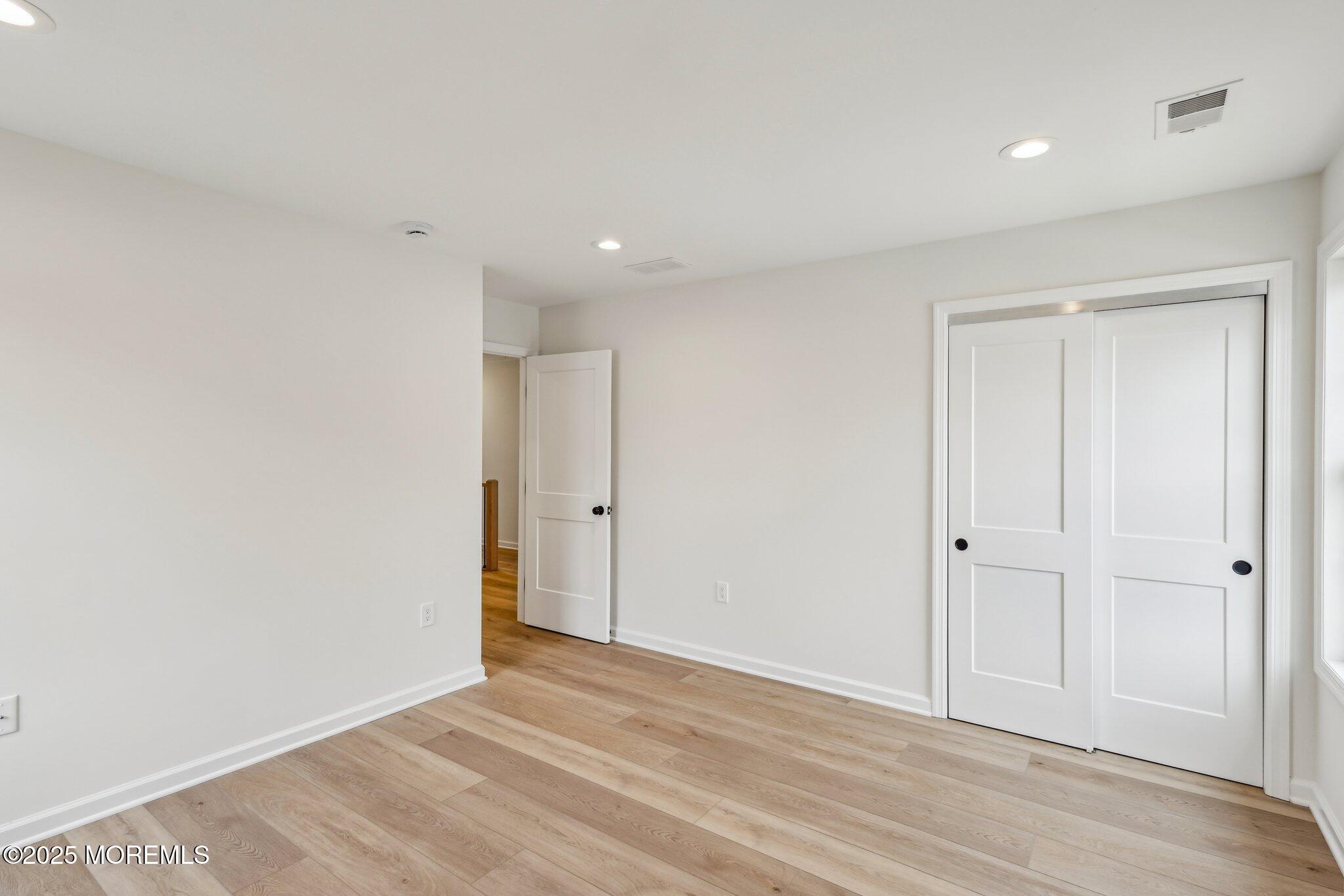 563 Holmdel Road Hazlet, NJ 07730 - Photo 20 of 50 a view of an empty room