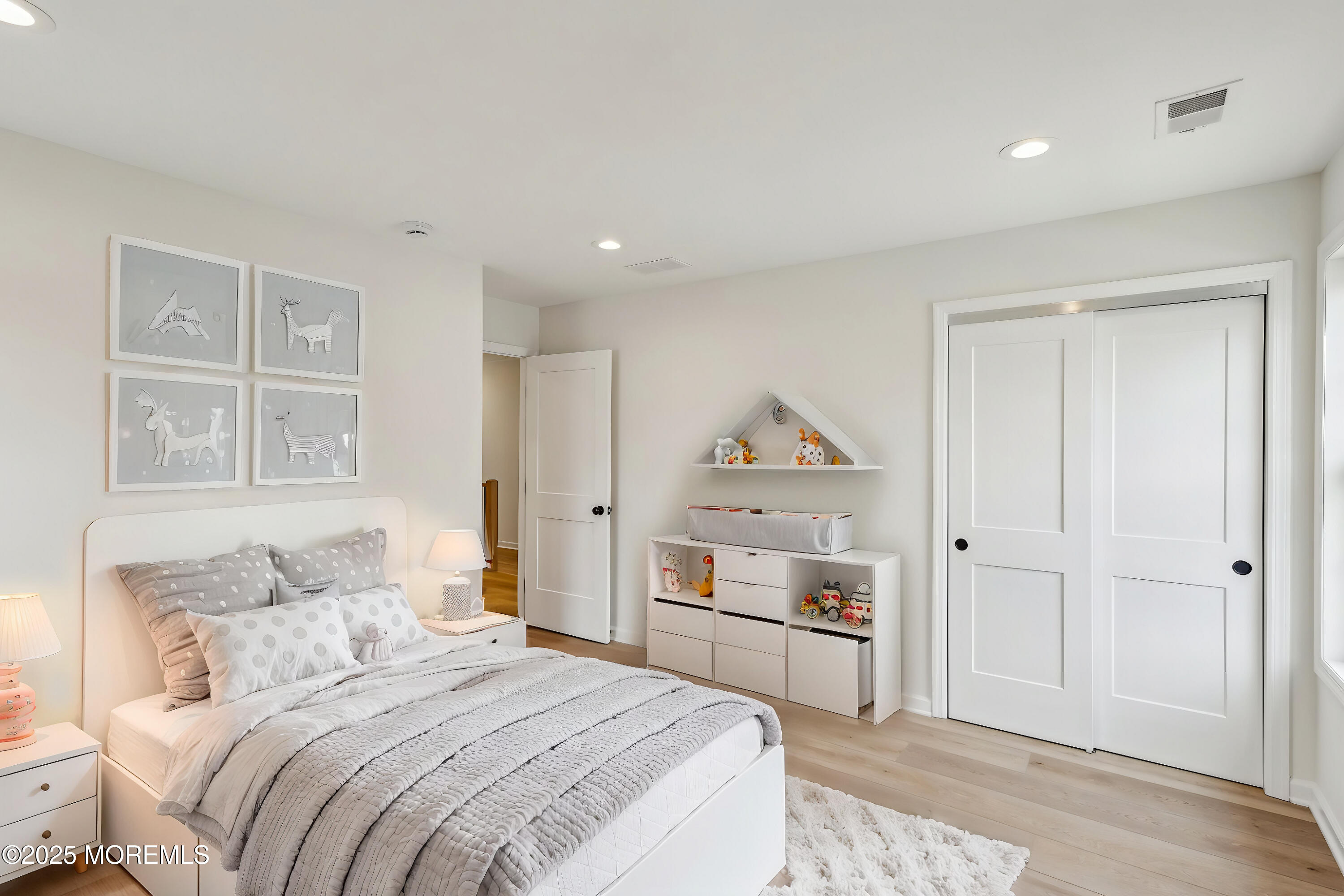 563 Holmdel Road Hazlet, NJ 07730 - Photo 21 of 50 a bedroom with a bed and a window