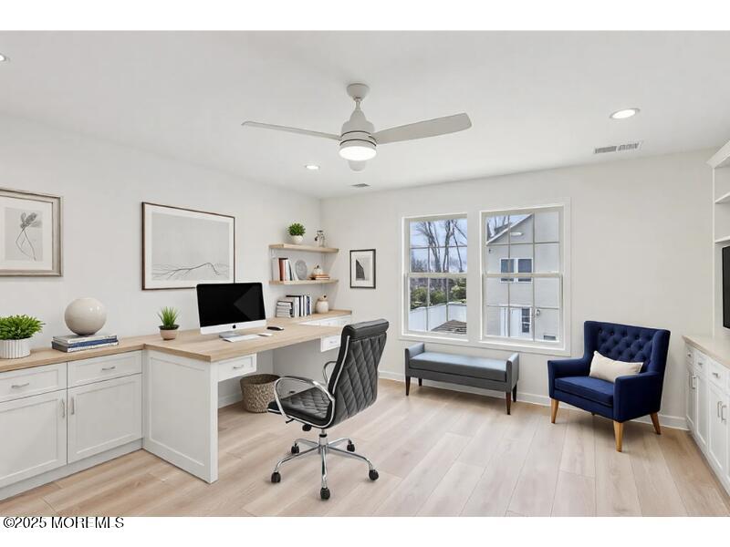 563 Holmdel Road Hazlet, NJ 07730 - Photo 29 of 50 a living room with furniture a piano and a flat screen tv