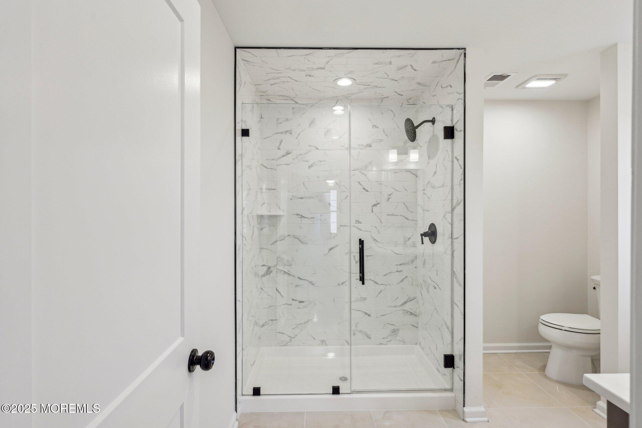 563 Holmdel Road Hazlet, NJ 07730 - Photo 41 of 50 a bathroom with a shower