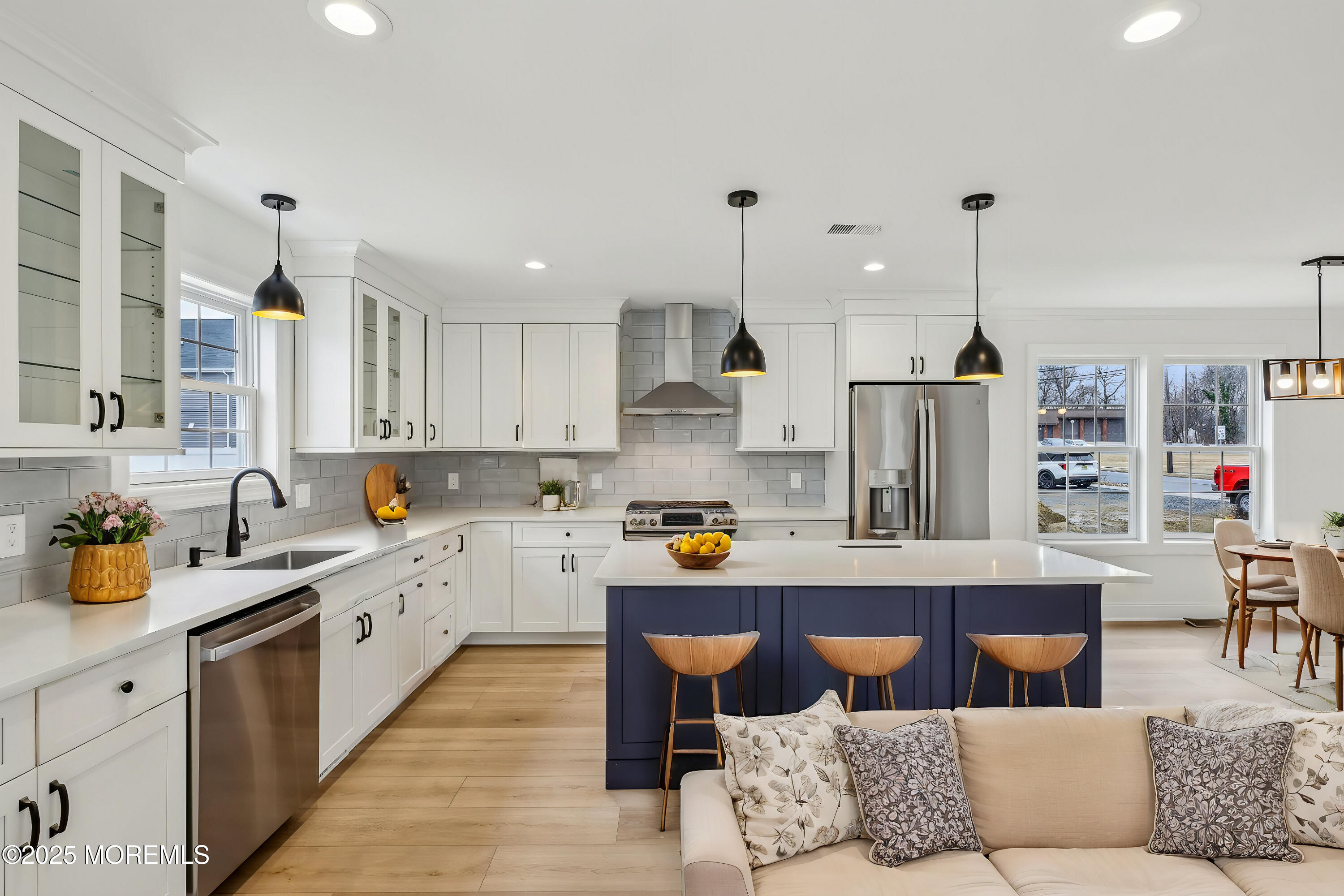 563 Holmdel Road Hazlet, NJ 07730 - Photo 10 of 50 a kitchen with stainless steel appliances granite countertop a refrigerator and a stove top oven