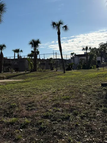 a view of a golf course with a park