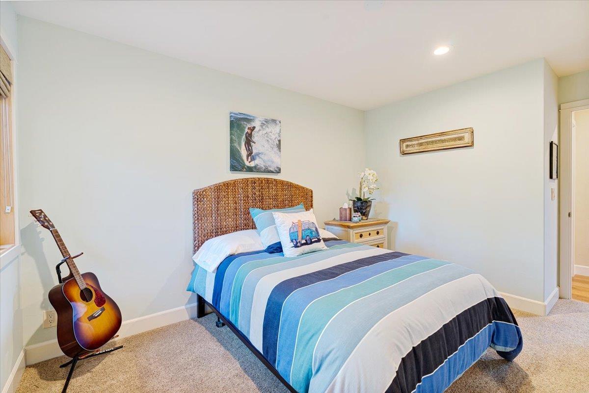 7409 Hihn Road Ben Lomond, CA 95005 - Photo 63 of 101 a bedroom with a bed and cabinets