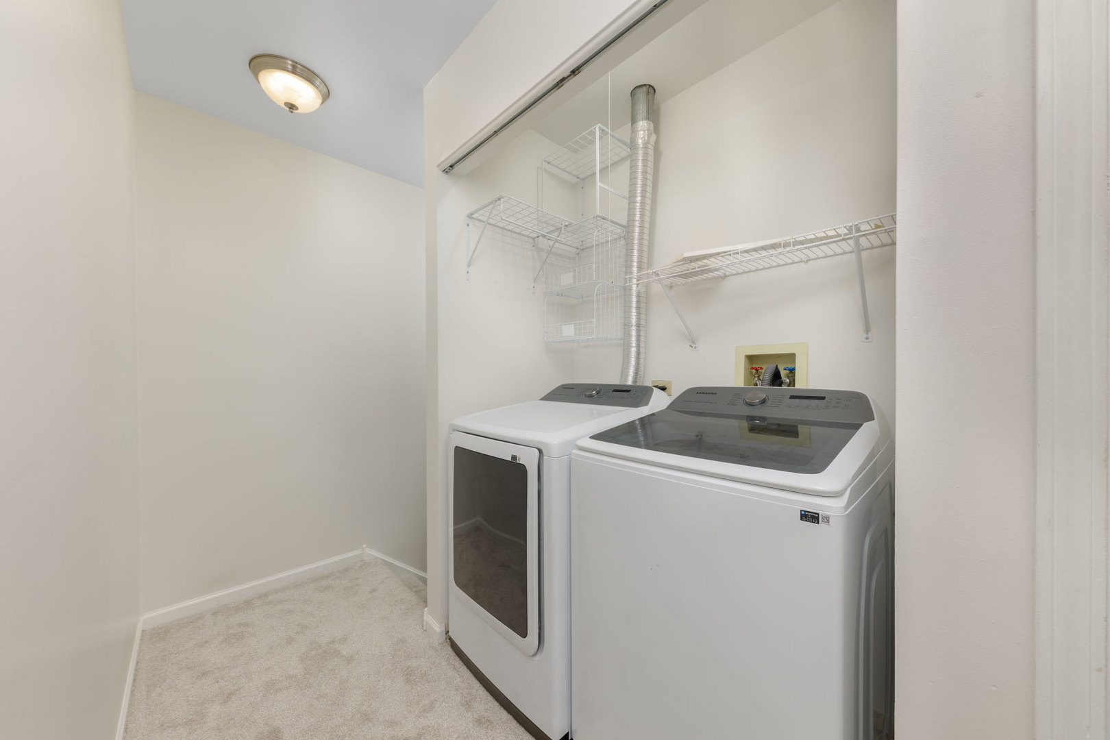 1604 Pebble Beach Circle Elgin, IL 60123 - Photo 17 of 37 a utility room with dryer and washer