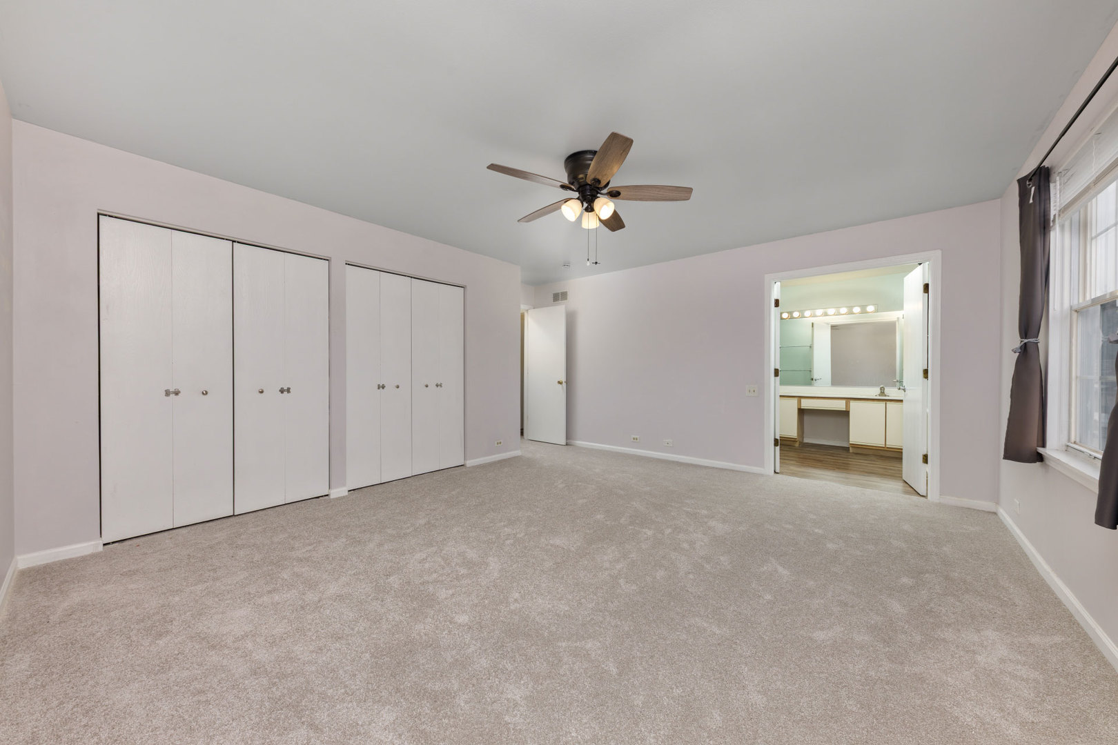1604 Pebble Beach Circle Elgin, IL 60123 - Photo 20 of 37 a view of an empty room with a window