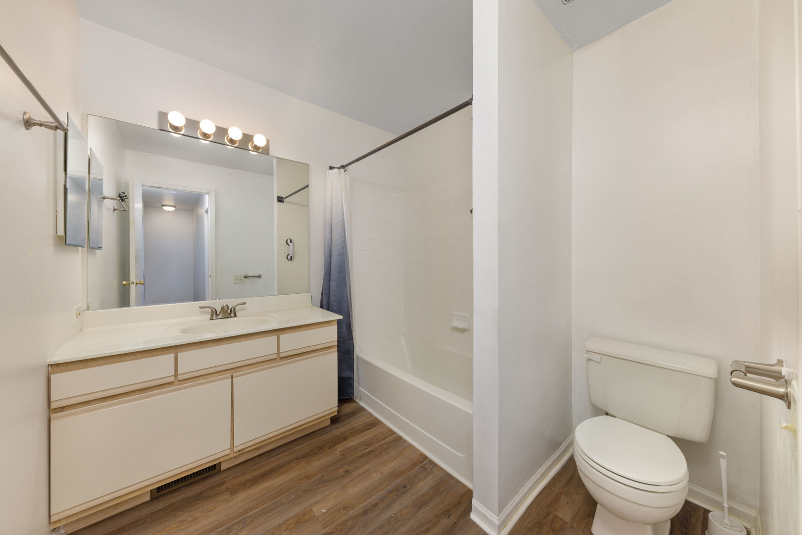1604 Pebble Beach Circle Elgin, IL 60123 - Photo 29 of 37 a spacious bathroom with a granite countertop sink a toilet mirror and shower