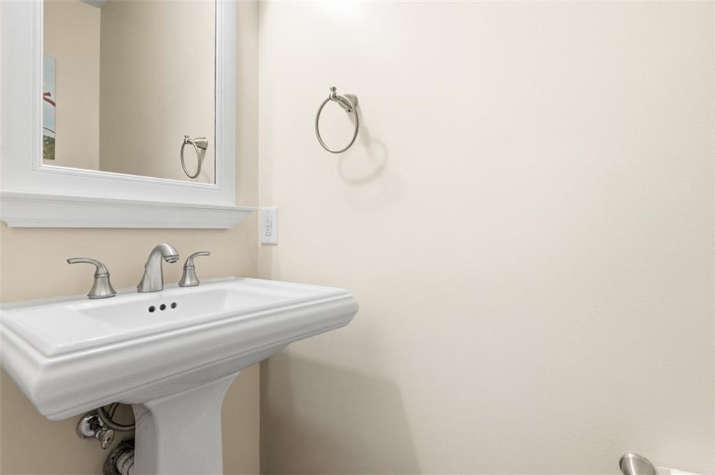 44 Rodgers Drive Coraopolis, PA 15108 - Photo 18 of 42 a bathroom with a sink and mirror
