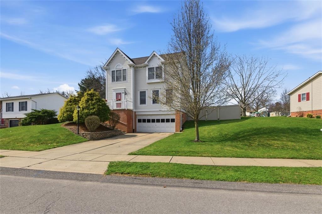 44 Rodgers Drive Coraopolis, PA 15108 - Photo 2 of 42 a view of house with a yard and large tree