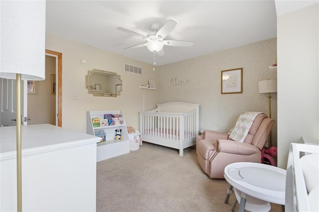44 Rodgers Drive Coraopolis, PA 15108 - Photo 23 of 42 a living room with furniture and a chandelier