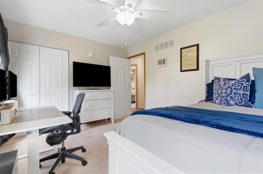 44 Rodgers Drive Coraopolis, PA 15108 - Photo 25 of 42 a bedroom with a bed and a flat screen tv