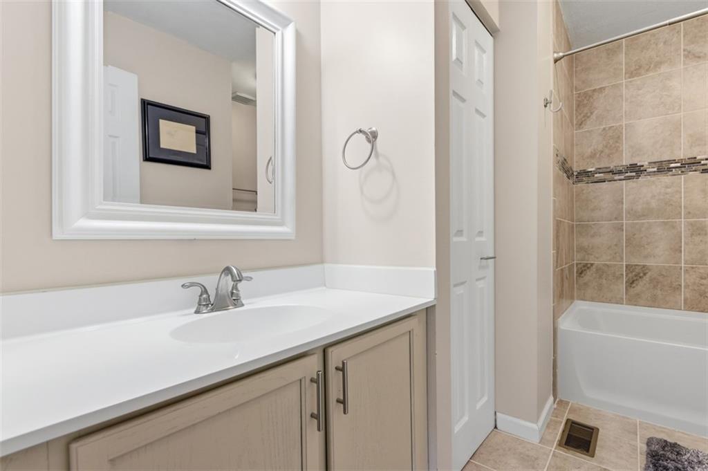 44 Rodgers Drive Coraopolis, PA 15108 - Photo 26 of 42 a bathroom with a sink and a mirror