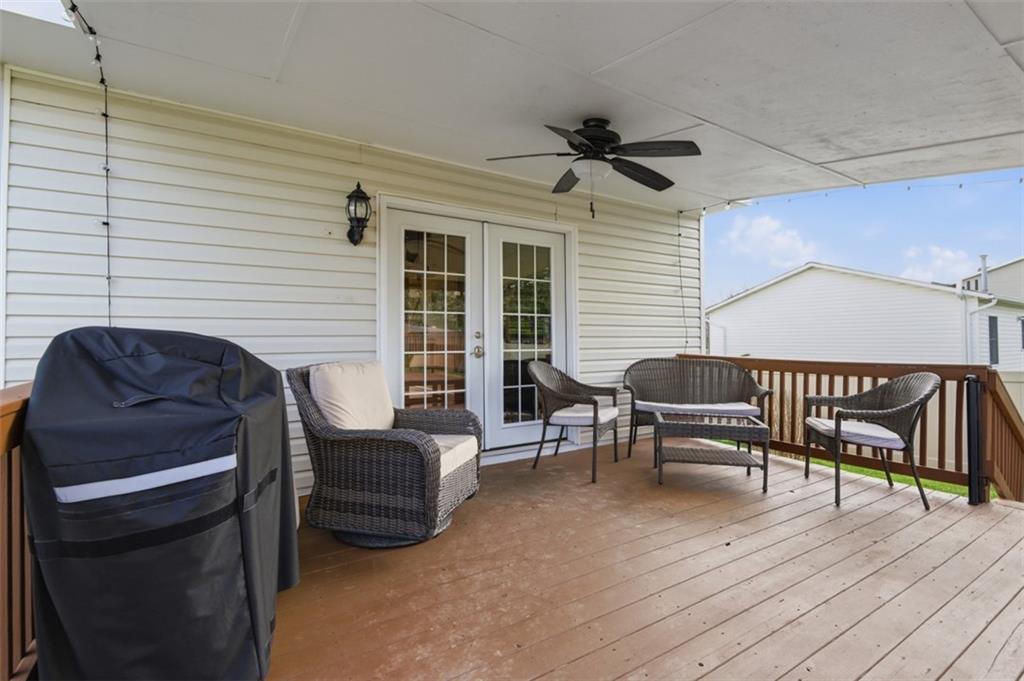 44 Rodgers Drive Coraopolis, PA 15108 - Photo 36 of 42 a outdoor living space with furniture and a wooden floor
