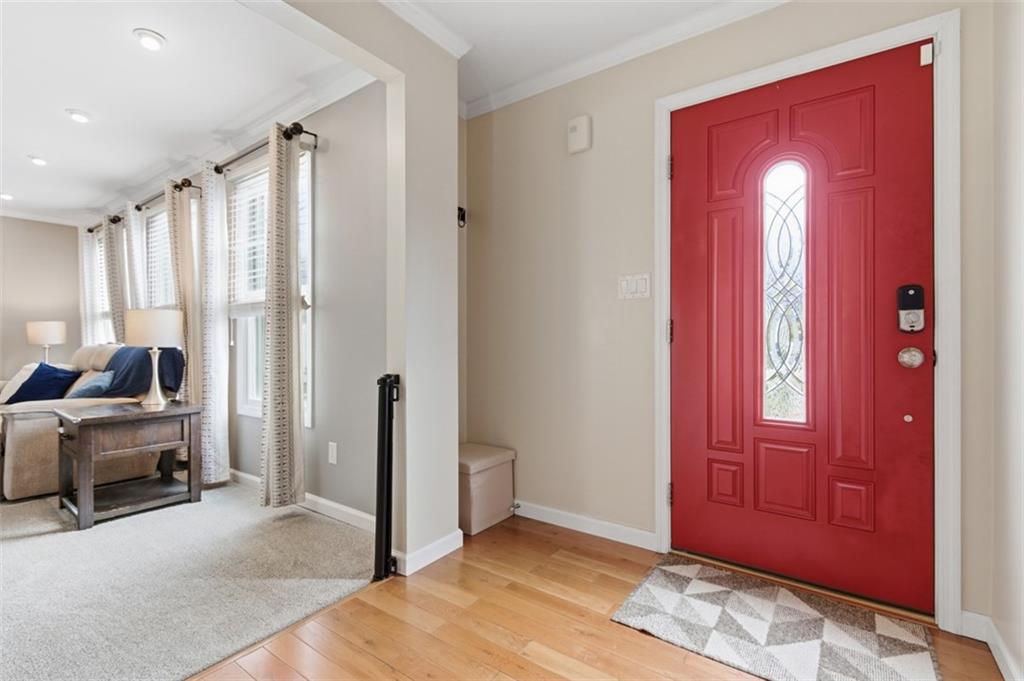 44 Rodgers Drive Coraopolis, PA 15108 - Photo 4 of 42 a view of a livingroom with a closet and mirror