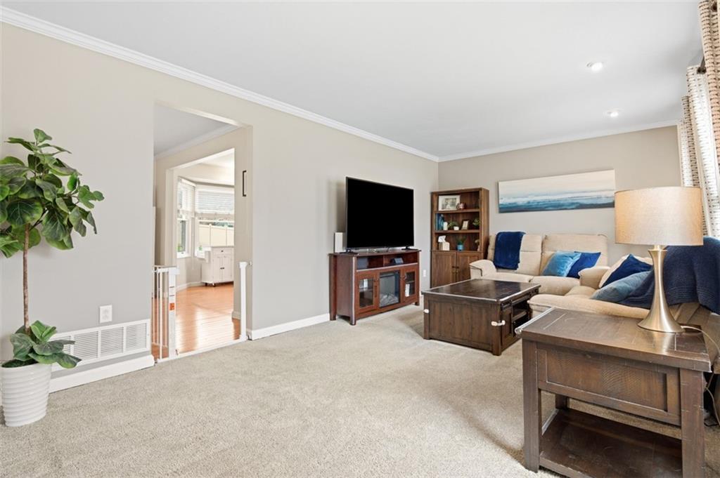 44 Rodgers Drive Coraopolis, PA 15108 - Photo 5 of 42 a living room with furniture and a flat screen tv