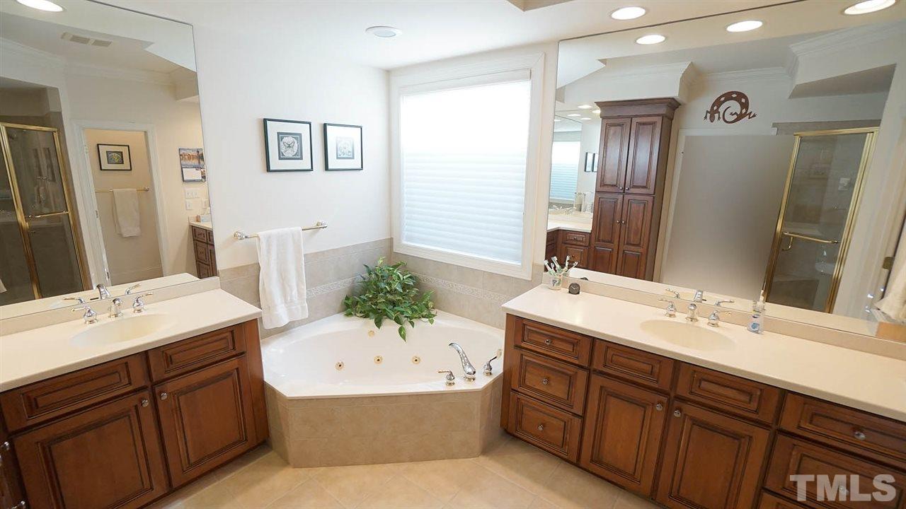 1844 Torrington Street Raleigh, NC 27615 - Photo 15 of 30 Whirpool tub and separate shower, newer fixtures