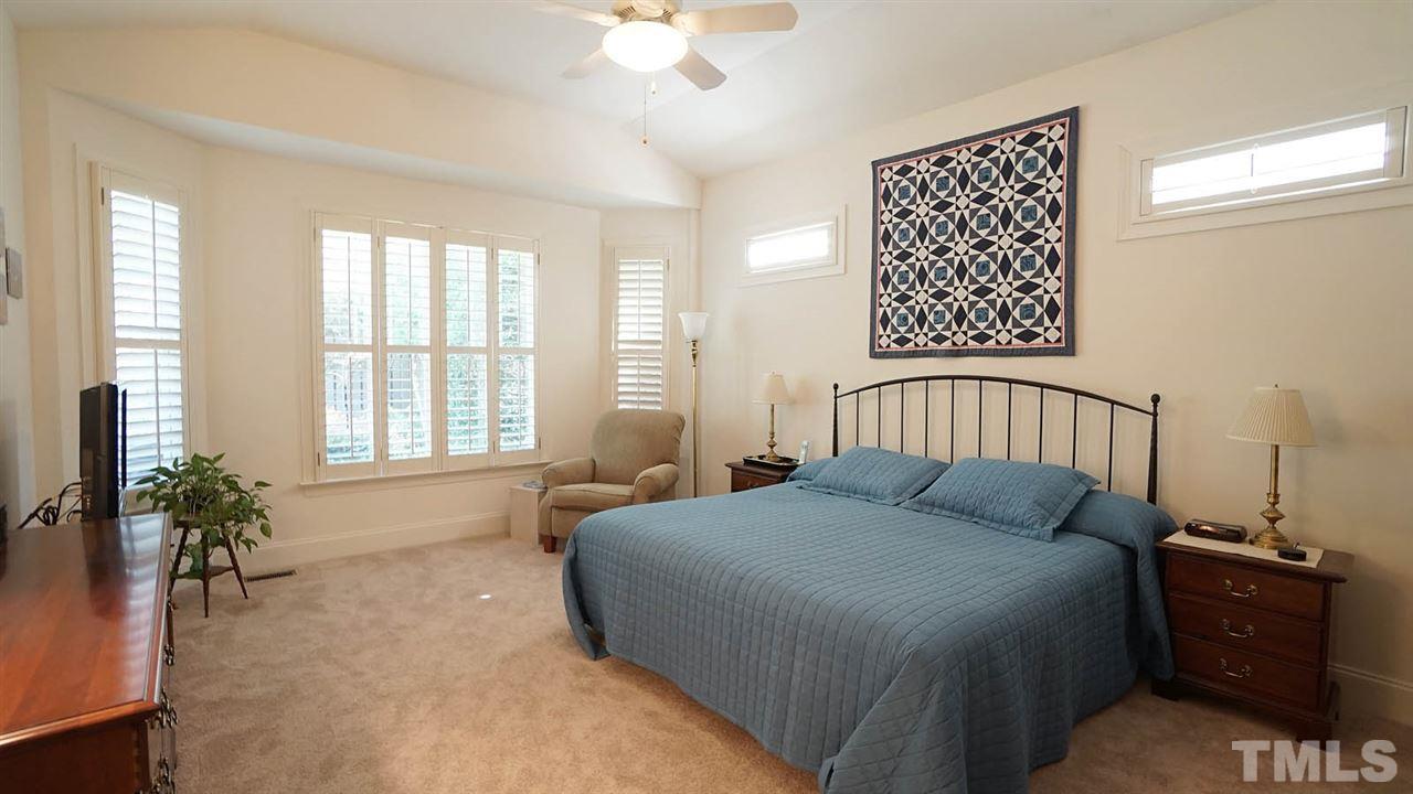 1844 Torrington Street Raleigh, NC 27615 - Photo 17 of 30 Main level master, overlooks private back yard, vaulted ceiling, ceiling fan