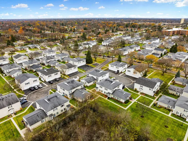 an aerial view of residential building with parking space