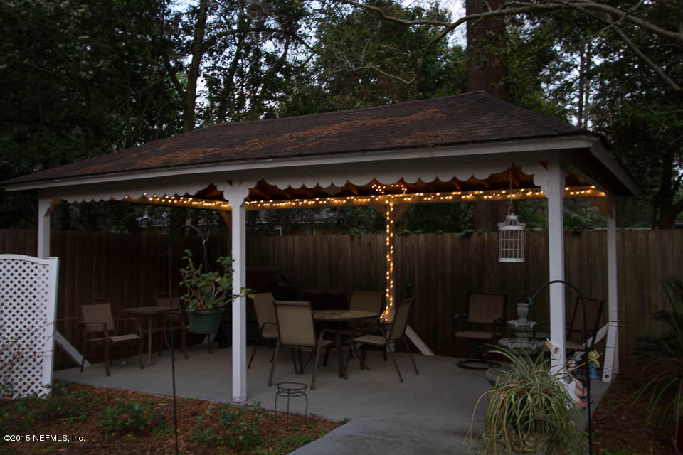 4656 Westfield Road Jacksonville, FL 32210 - Photo 54 of 54 a view of outdoor space with seating area and furniture