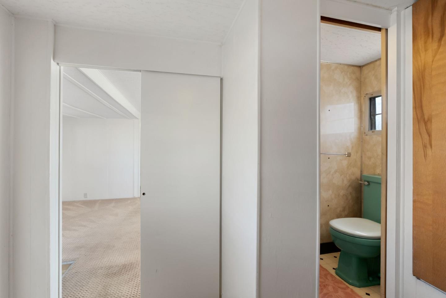 750 47th Avenue, Unit 53 Capitola, CA 95010 - Photo 21 of 39 a bathroom with a toilet and a shower