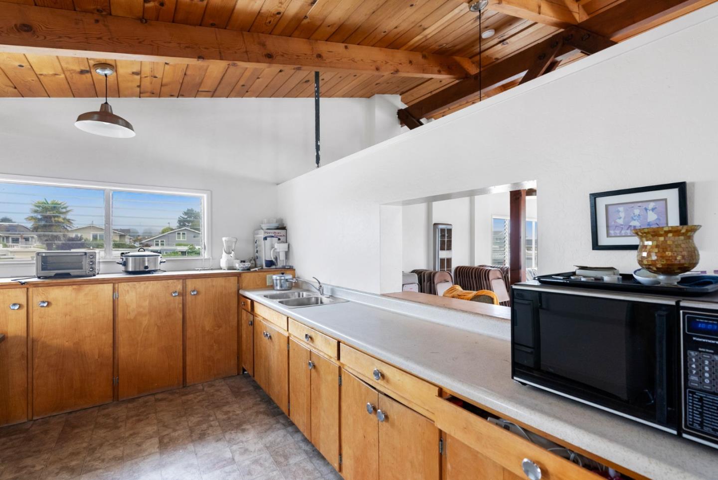 750 47th Avenue, Unit 53 Capitola, CA 95010 - Photo 35 of 39 a kitchen with stainless steel appliances a stove a sink and a refrigerator