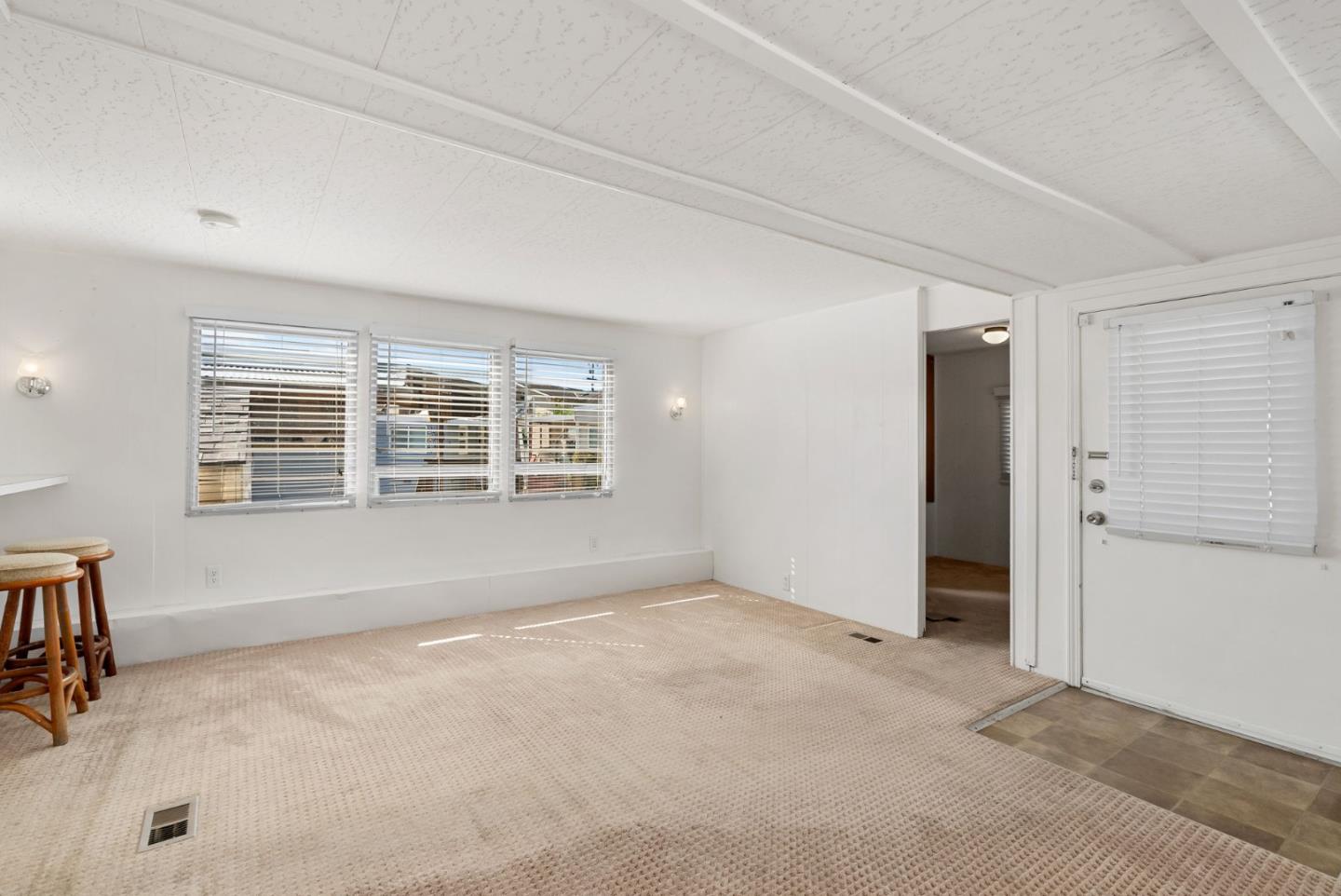 750 47th Avenue, Unit 53 Capitola, CA 95010 - Photo 10 of 39 an empty room with windows