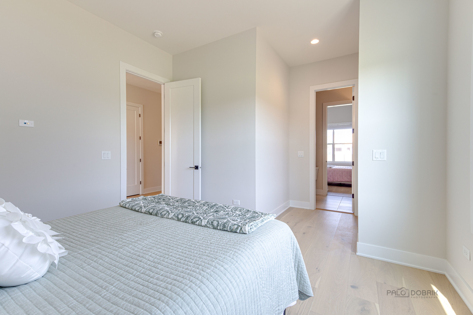 3531 South Riding Ridge Elgin, IL 60124 - Photo 25 of 36 a bedroom with a bed and a mirror