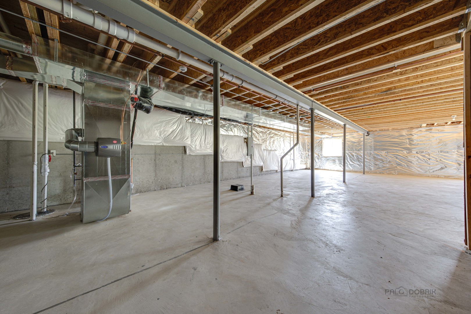3531 South Riding Ridge Elgin, IL 60124 - Photo 31 of 36 a view of an empty room with wooden floor and a shower