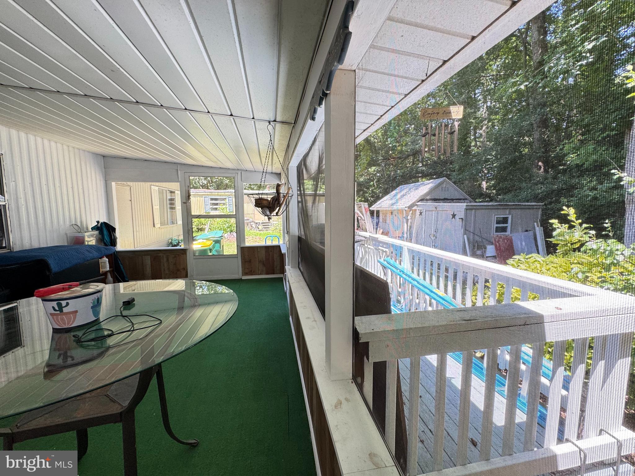 34118 Pinewood Circle, Unit 11080 Lewes, DE 19958 - Photo 21 of 22 a view of a balcony and chairs