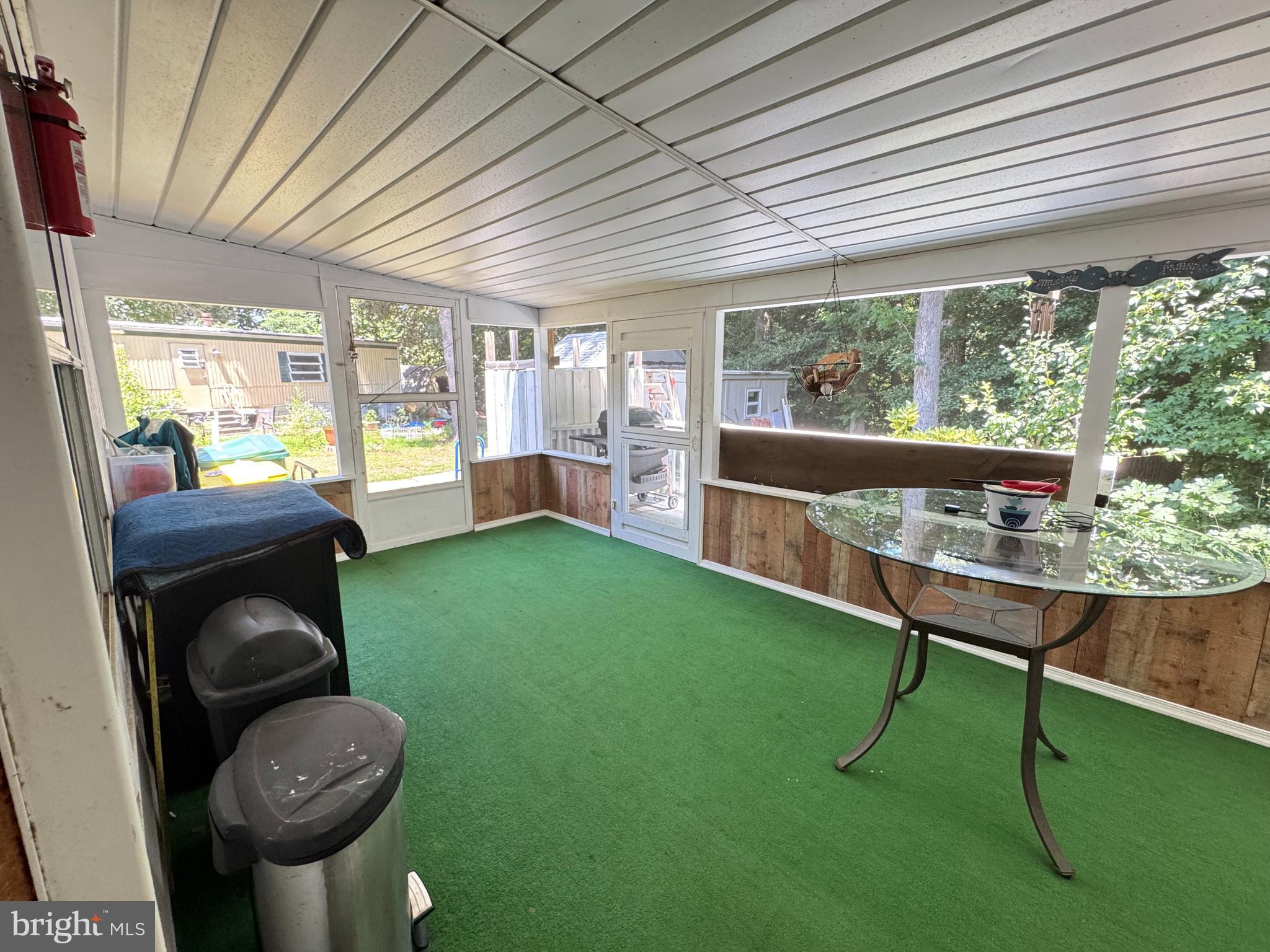 34118 Pinewood Circle, Unit 11080 Lewes, DE 19958 - Photo 22 of 22 a living room with furniture and a large window