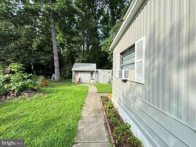 a house with garden in front of it