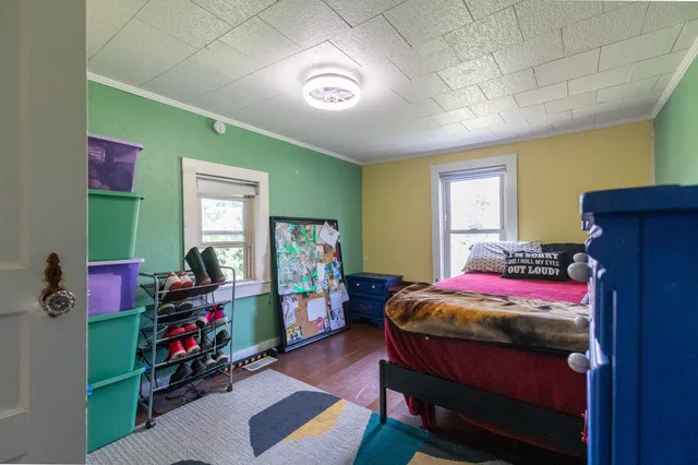 a kitchen with a sink cabinets and window