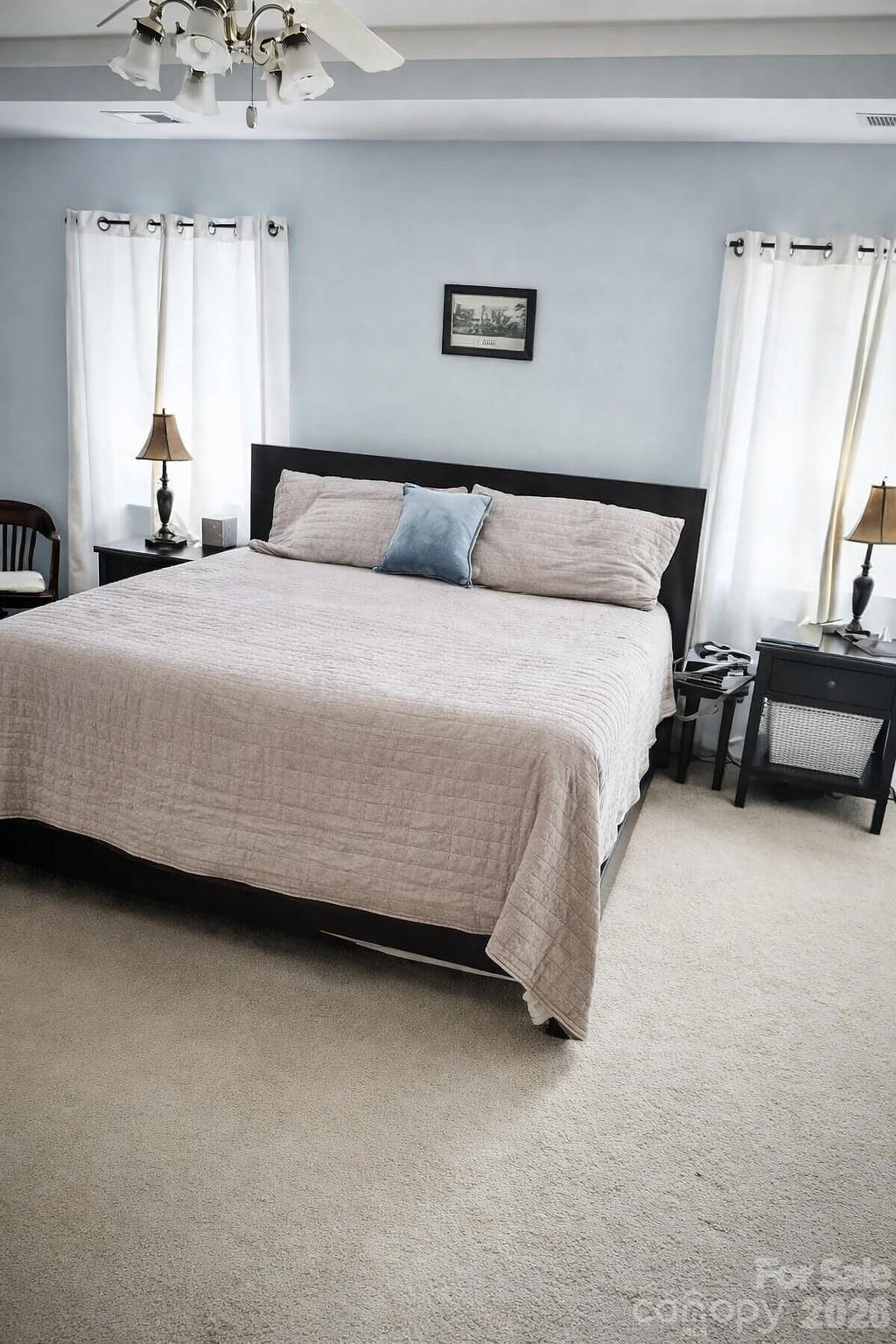 8006 Fine Robe Drive Indian Trail, NC 28079 - Photo 21 of 25 a bedroom with a bed and a dresser