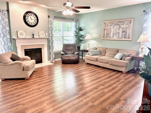 8006 Fine Robe Drive Indian Trail, NC 28079 - Photo 9 of 25 a living room with furniture and a fireplace