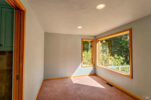 a bathroom with a small shower