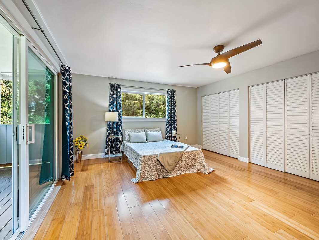 84-5085 Painted Church Road Honaunau, HI 96704 - Photo 9 of 30 a living room with a couch and wooden floor