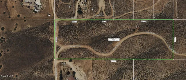 a view of an ocean and a mountain