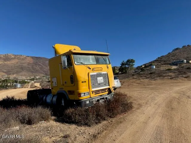 a view of mountains and valleys