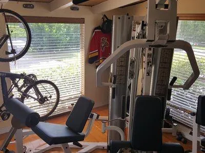 a view of a balcony with furniture and a window