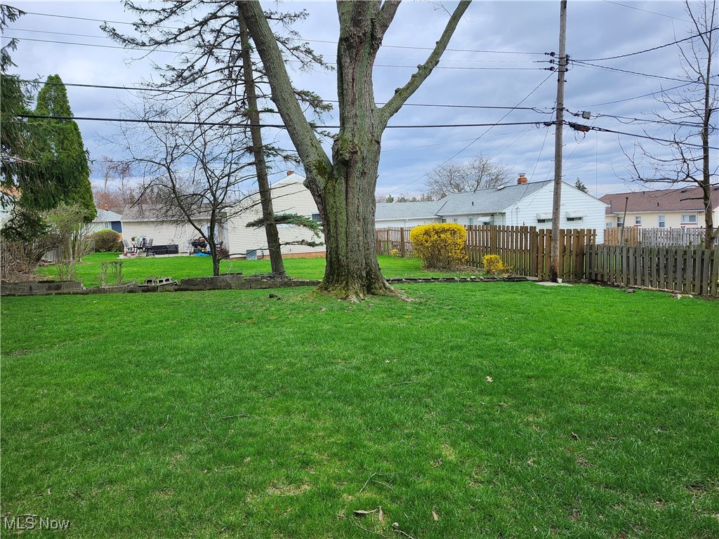4481 Springvale Drive Cleveland, OH 44128 - Photo 2 of 4 View of yard with fence