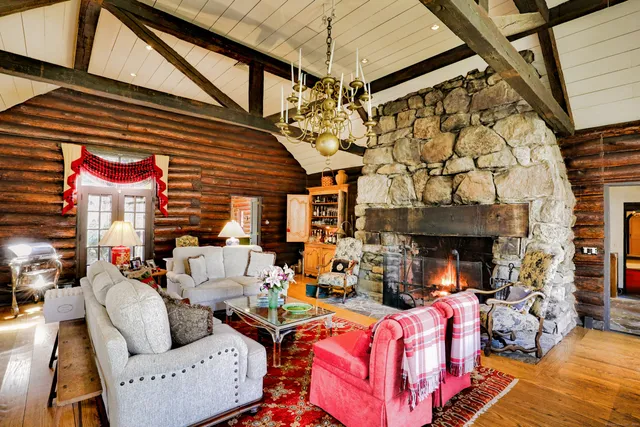 a building outdoor space with patio furniture and potted plants